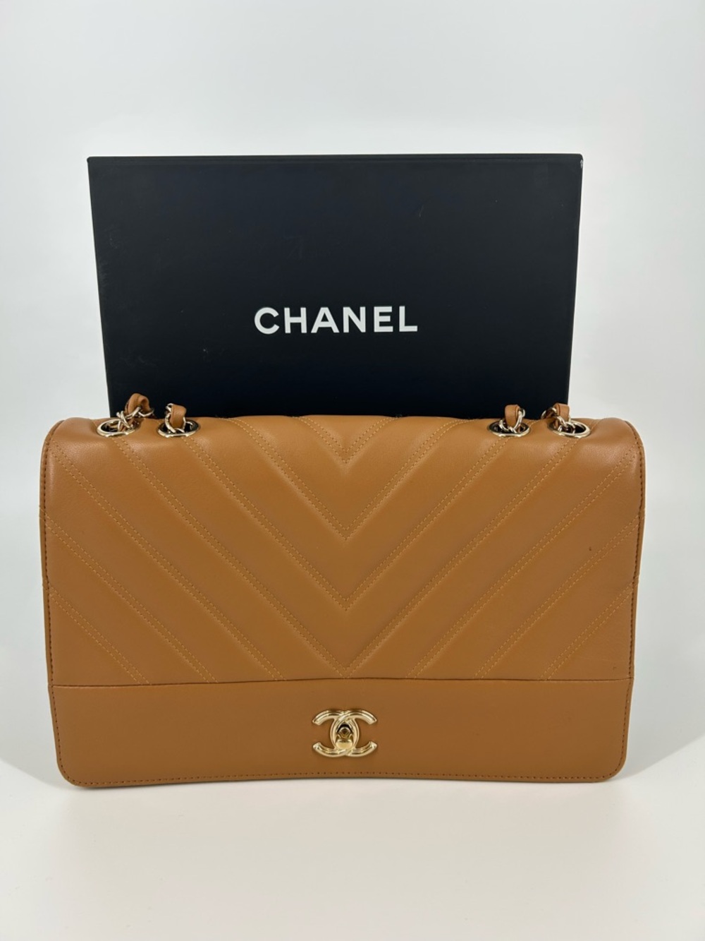 CHANEL Chevron Quilted Leather bag in Carmel/ Brown